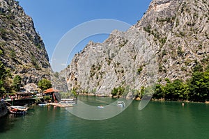 MATKA, NORTH MACEDONIA - AUGUST 10, 2019: Boating in Matka canyon in North Macedon