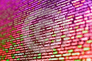 Matrix byte of binary data rian code running abstract background in dark blue digital style. Writing programming code on laptop.