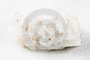 matrix of colorless Rock crystals on white marble