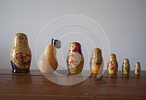 Matryoshka dolls with pear among them