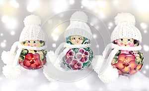 Matryoshka dolls in winter outfits