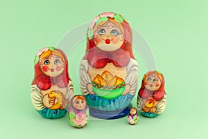 Matryoshka isolated on green background