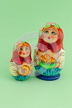 Matryoshka isolated on green background