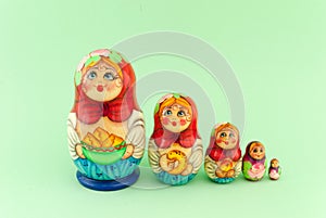 Matryoshka isolated on green background