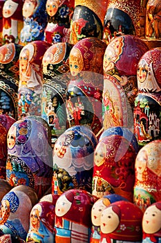 Matryoshka nesting dolls lined up, souvenirs from Russia, wooden dolls, ceramics, different traditional dress