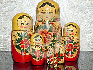 Matryoshka-Russian folding doll made of wood, inside which there are dolls of smaller size. Semenovskaya matryoshka