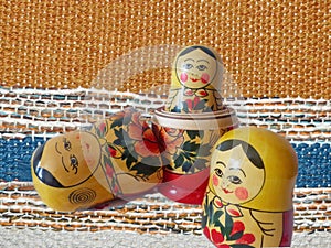 Matryoshka-Russian folding doll made of wood, inside which there are dolls of smaller size. Semenovskaya matryoshka