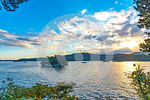 Matsushima Bay in dusk, beautiful islands covered with pine trees and rocks photo