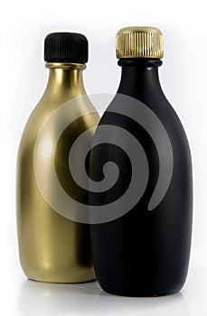 Matte black and gold bottles