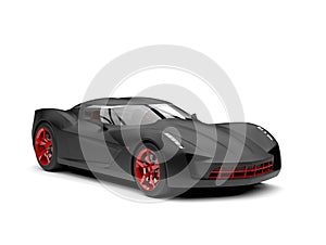 Matte black super sports concept car with red rims and details - beauty shot