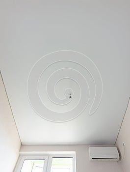 Matte vinyl stretch ceiling in the interior of the room