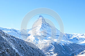 The Matterhorn mountain, scenic view on snowy landscape in winter, Switzerland