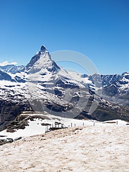 Matterhorn peak in sunny day view from gornergrat train station, Zermatt, Switzerland.