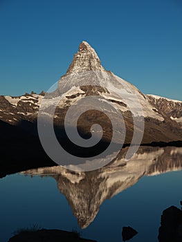 Matterhorn Reflection In Stellisee During Sunrise
