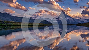 Matterhorn and reflection on the water surface at the morning time. Matterhorn, Switzerland. Beautiful natural landscape in the Sw