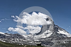 Matterhorn summit withn a typical cloud flag, Zermatt ,Wallis, Switzerland