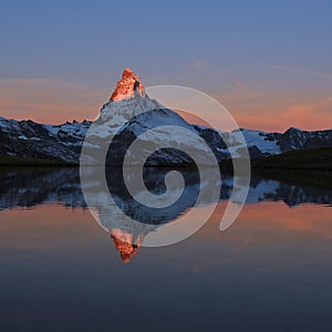 Matterhorn at sunrise reflecting in Lake Stelli.