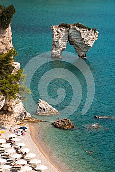 Mattinata Faraglioni stacks and beach coast of Baia Delle Zagare, Vieste Gargano, Apulia, Italy