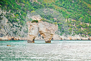 Mattinata Faraglioni stacks and beach coast of Mergoli, Vieste Gargano, Apulia, Italy.