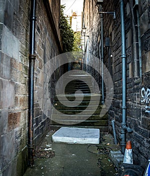 Mattress in a narrow alleyway