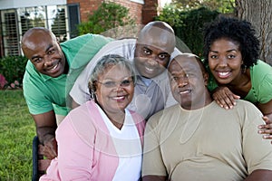 Mature African American couple and their adult kids.