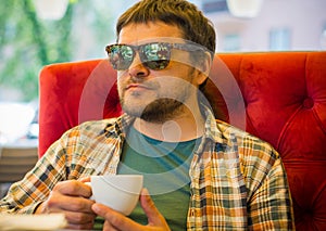 Middle age man lifestyle, guy at cafe photo
