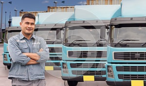 Mature Asian man occupation truck driver smiling confident optimistic his arms crossed