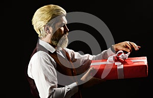 Mature bearded hipster hold present box. Special occasion. Box holiday package. Delivering precious product. Perfect