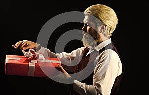 Mature bearded hipster hold present box. Special occasion. Box holiday package. Delivering precious product. Perfect