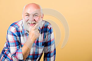 Mature bearded man in checkered shirt. positive emotions. happy old grandad. grandfather on retirement. barber and