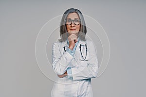 Mature beautiful female doctor looking at camera and smiling