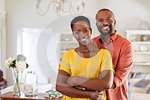 Mature black couple hugging and smiling