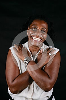 mature black woman wearing white blouse