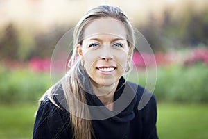 Mature Blond Woman Smiling Outside