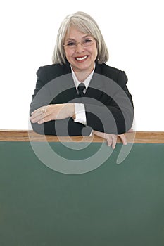 Mature business woman with blackboard