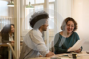 Woman explaining project details in meeting