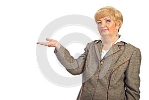 Mature business woman make presentation to copy