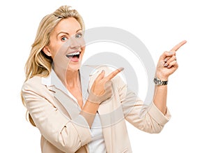 Mature business woman pointing empty copy space smiling isolated
