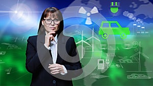 Mature business woman posing on green background with icons of electric car