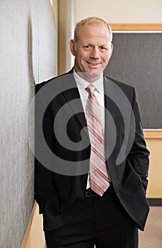 Mature businessman in full suit and tie