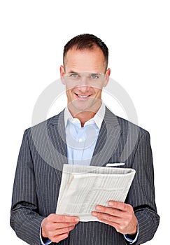 Mature businessman reading a newspaper