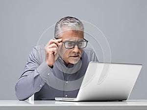 Businessman having vision problems