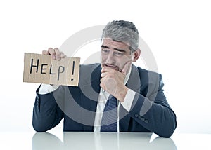 Mature businessman worried and desperate asking for help