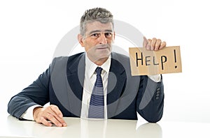 Mature businessman worried and desperate asking for help