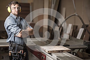 Mature carpenter in the workshop photo