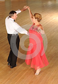 Mature couple ballroom dancing