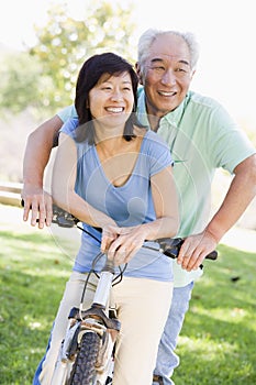 Mature couple bike riding