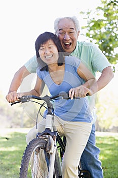 Mature couple bike riding.