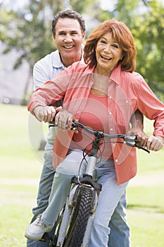 Mature couple bike riding.