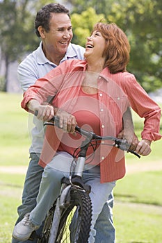 Mature couple bike riding.